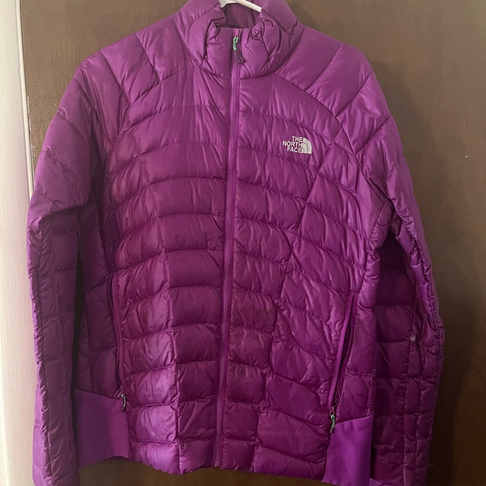 Purple north face puffer jacket size m couple stains on front but not rip’s